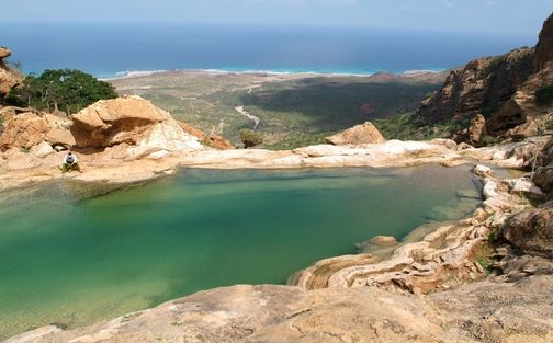 An image of Socotra natural infinity pool with see background