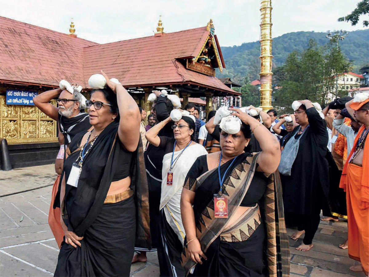 The dress code for the temple is pure black because the god Ayyappa is known to be as bhramachari